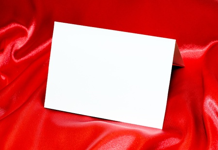 Blank paper on silk backgroundの写真素材