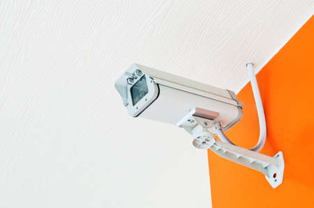Security Camera or CCTV on Orange wall