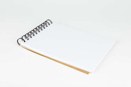 open notebook isolated on white backgroundの写真素材