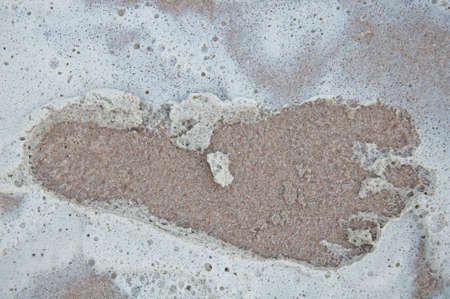 Footprints on the beachの写真素材