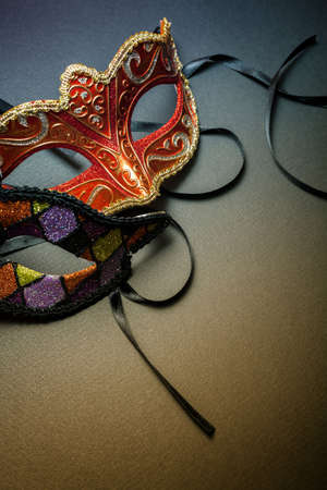 Carnival masks on a yellow-blue backgroundの写真素材