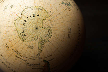 Globe on a wooden surfaceの写真素材