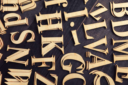 Wooden letters on dark wooden backgroundの写真素材