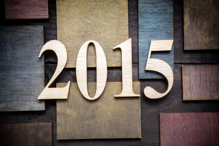 Wooden letters forming number 2015 written on wooden backgroundの写真素材