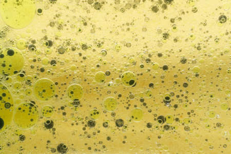 Oil drops on a water surface