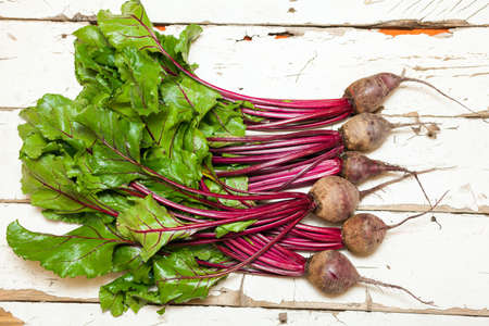 Beetroots on a old wooden white table