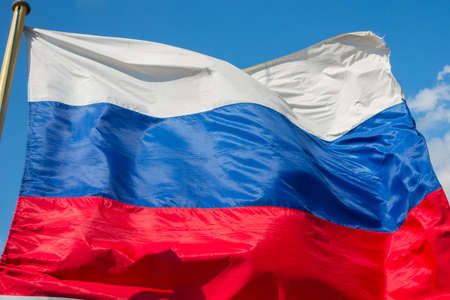 Russian flag, growing in the wind