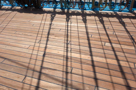 Marine rope ladder at pirate ship. Sea hemp ropes on the old nautical vessel. Ladder upstairs on the mast.の写真素材