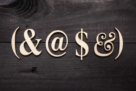 Wooden letters on dark wooden backgroundの写真素材