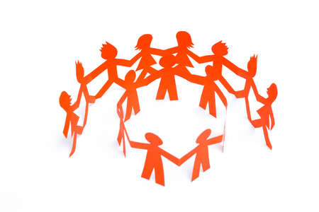 Group of paper doll holding hands. Teamwork concept paper craft. Orange dolls on white background

の写真素材