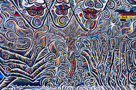 BERLIN, GERMANY-FEB 15:East Side Gallery Berlin graffiti on Feb 15,2014 in Berlin. It's a 1.3 km long part of original Berlin Wall which collapsed in 1989 and now is the largest world graffiti galleryのeditorial素材