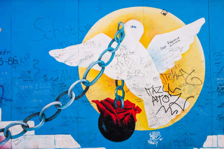 BERLIN, GERMANY-FEB 15:East Side Gallery Berlin graffiti on Feb 15,2014 in Berlin. It's a 1.3 km long part of original Berlin Wall which collapsed in 1989 and now is the largest world graffiti galleryのeditorial素材
