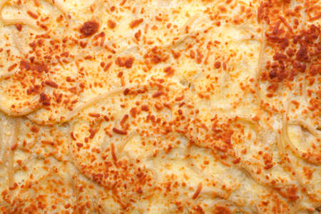 Pastitsio on top view. Meat and pasta topped with bechamel sauce and cheese, with tomato. Selective...