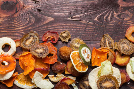 Dried fruits on a wooden surface