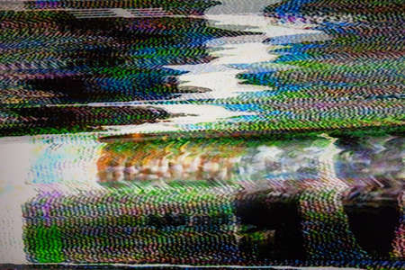 Television screen with static noise caused by bad signal receptionの写真素材