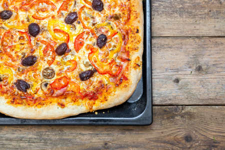 Oven Baked Pizza With Vegetarian Toppings Hot From The Ovenの写真素材