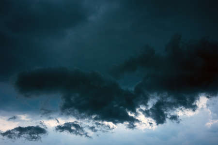 Dark storm clouds before rain の写真素材