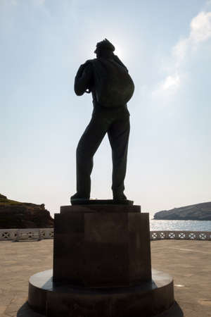 ANDROS, GREECE - JULY 22, 2014: Square Unknown Sailor, is the northernmost island of the Greek Cyclades archipelago in the Aegean Sea - area is 380 km2, 40 km long, and its greatest breadth is 16 km.の写真素材
