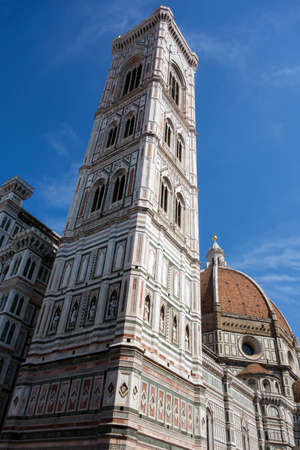 Piazza del Duomo in Florence filled with tourists during the dayの写真素材