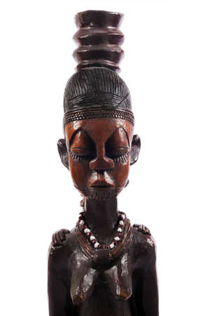 African wooden figure against white backgroundのeditorial素材