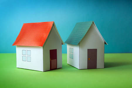 Papercraft House. Small houses from paper. Quality of life concept.の写真素材