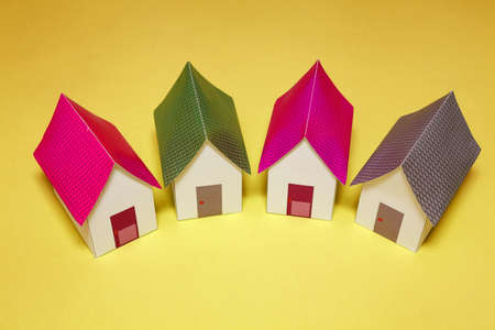 Papercraft House. Small houses from paper. Quality of life concept.の写真素材