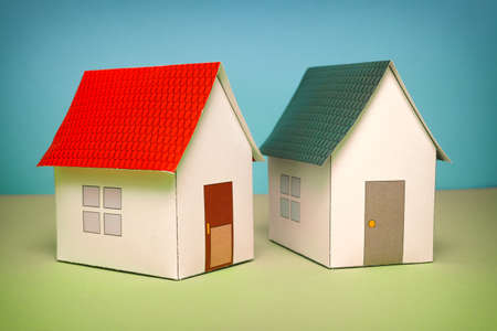 Papercraft House. Small houses from paper. Quality of life concept.の写真素材