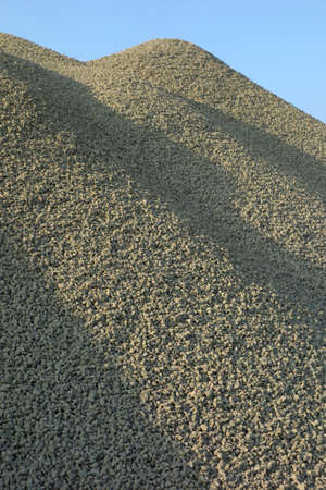 Pile of green gravel - sand, ready to be used as a construction materialの写真素材