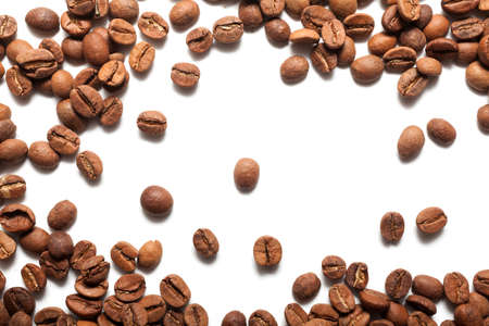 Roasted coffee beans pile on white backgroundの写真素材