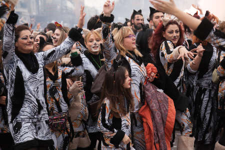 XANTHI, GREECE - FEB 22: Unidentified participants of carnival street parade in Xanthi on Feb. 22, 2015 in Rodopi, Xanthi, Greece. Group of people dancing dressed in carnival costumes.のeditorial素材