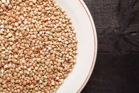 Î’uckwheat groats in ceramic dish