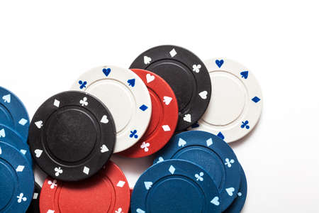 Poker chips isolated against a white backgroundの写真素材