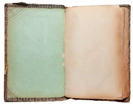Open old book on white background