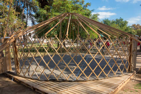GREECE, ALEXANDROUPOLIS - OCTOBER 15, 2015: Construction scene yurt from the team of Caravan Project, that's camping and traveling to towns and villages in two scenes Mongolian yurt with educational and cultural activities.のeditorial素材