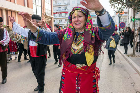 ALEXANDROUPOLIS, GREECE - DEC 31, 2015: Revival of the custom of camel by the Cultural Educational Association of Eastern Rumelia Ebrou around the Town Hall in the city centerのeditorial素材