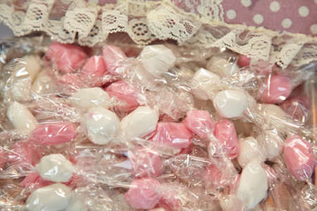 Different colored baptism candy favorの写真素材