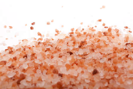 Background of Himalayan salt, pink and orange coarse crystalsの写真素材