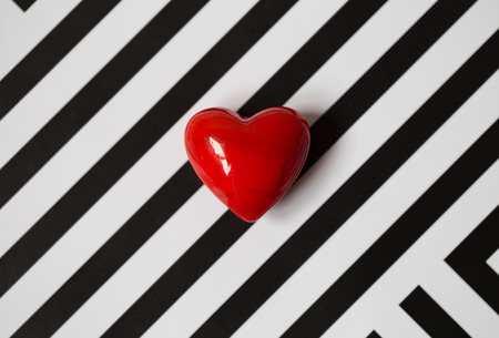 Little red heart on a white backgroundの写真素材