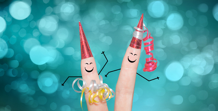 Two cute fingers dancing on a partyの写真素材