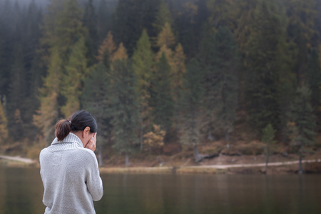 Anonymous young woman cryingの写真素材