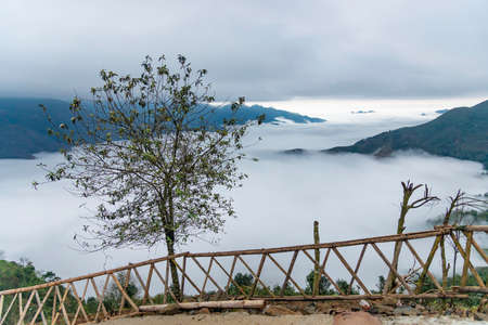 Ta Xua is a famous mountain range in northern Vietnam. All year round, the mountain rises above the clouds creating cloud inversions.の写真素材