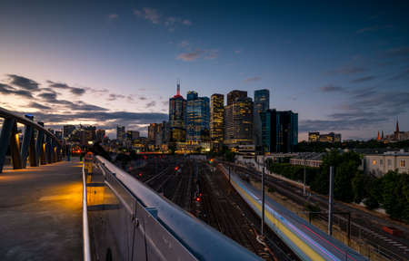 View of modern buildings and traffic trails in Melbourne CBD, Australia at nightの写真素材
