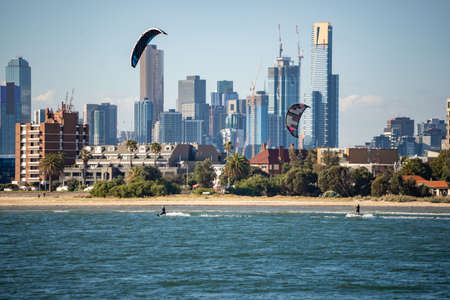 People kite surfing on St Kilda Beach in Melbourneのeditorial素材