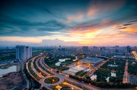Hanoi skyline cityscape during sunset period at intersection Khuat Duy Tien - Tran Duy Hung st in Cau Giay districtの写真素材
