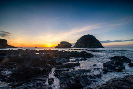 Yen island in An Hoa Commune, Phu Yen province, Vietnam. It includes 2 small islands (Hon Noi & Hon Ngoai) and are famous for harboring birds' nests (yen sao), a local delicacy. They are found in caveの写真素材