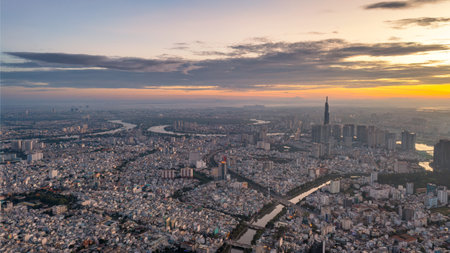 Top View of Building in a City - Aerial view Skyscrapers flying by drone of Ho Chi Minh City with development buildings, transportation, energy powerの写真素材