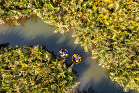 VIEW OF RUNG DUA BAY MAU OR COCONUT WATER ( MANGROVE PALM ) FOREST 7 HECTA IN CAM THANH VILLAGE, HOI AN ANCIENT TOWN, UNESCO WORLD HERITAGE, VIETNAM. HOI AN IS ONE OF THE MOST POPULAR DESTINATIONSの写真素材