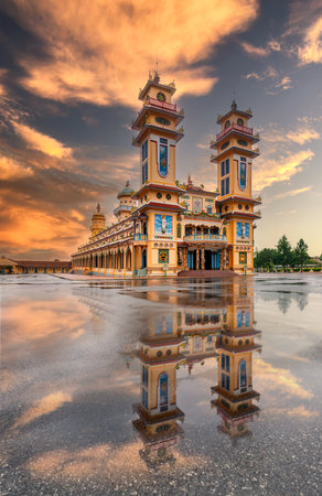 The Tay Ninh Holy See, also known as the Great Divine Temple or the Cao Dai Temple. It serves as the central house of worship for Caodaism, a religion founded in the early 20th century.の写真素材