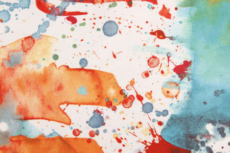 Colorful splattered paint to be used as background textureの写真素材