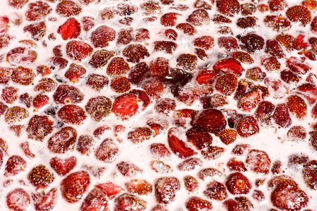 Sticky strawberry jamの写真素材